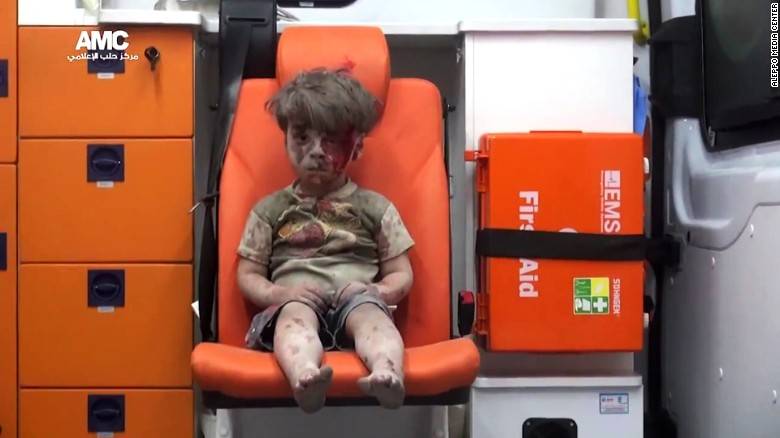 I was not shocked to see this brutal photograph of a little Syrian boy