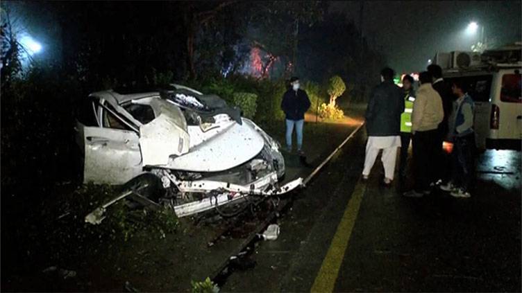 Four injured as car hits electric poll in Lahore