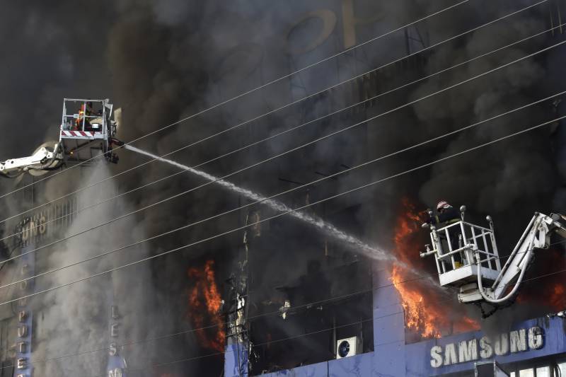 Fire at Lahore plaza brought under control after seven hours