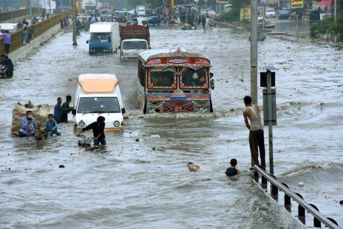 Two missing after three swept away by flash flood in Karachi