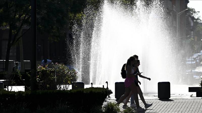 More than half of US under heat, flood advisories