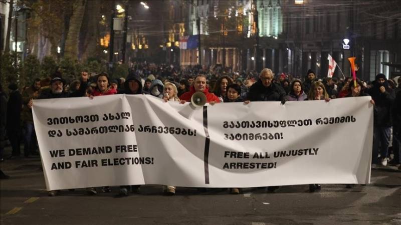 Thousands gather in Georgia's capital to protest decision to suspend EU accession talks