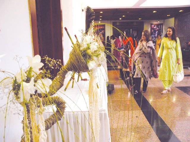 Floral art experts demonstrate skills