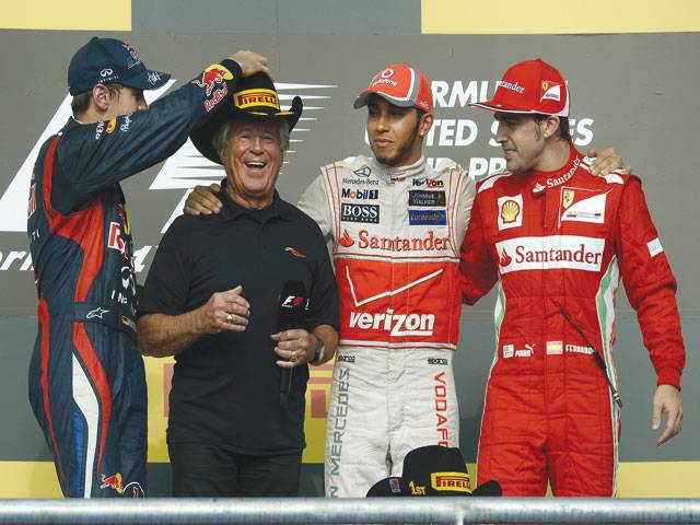 Hamilton spoils Vettel's title party