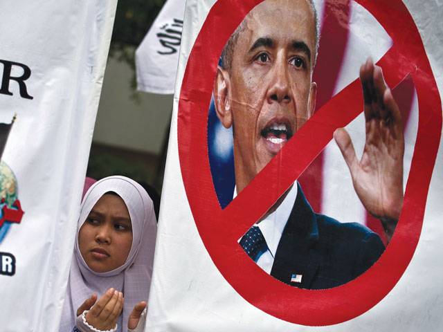 Malaysian Muslims protest against US president’s visit