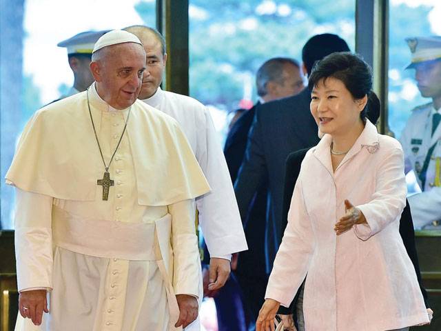 Pope kicks off S Korea visit, North fires rockets