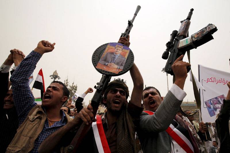 Supporters of Yemen's former President participate during a rally against air strikes in Sanaa