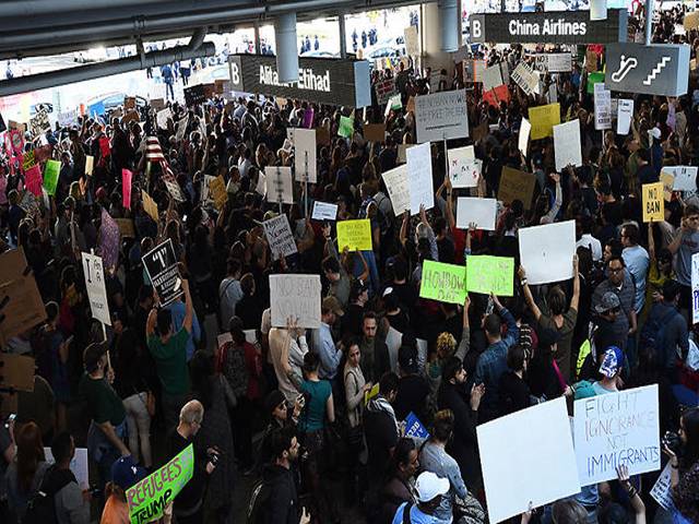 US reverses travel ban as Trump fumes