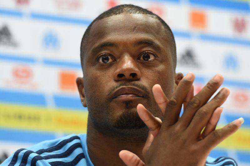 'Karate kick' Evra leaves club, banned till June 30