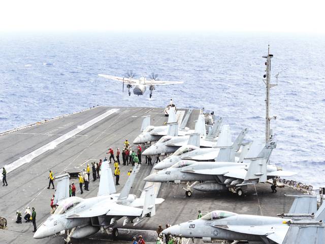 Eight rescued from crashed US Navy aircraft