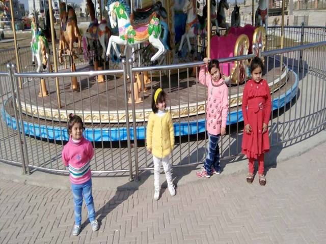  Children are playing newly City land Park in Jhelum