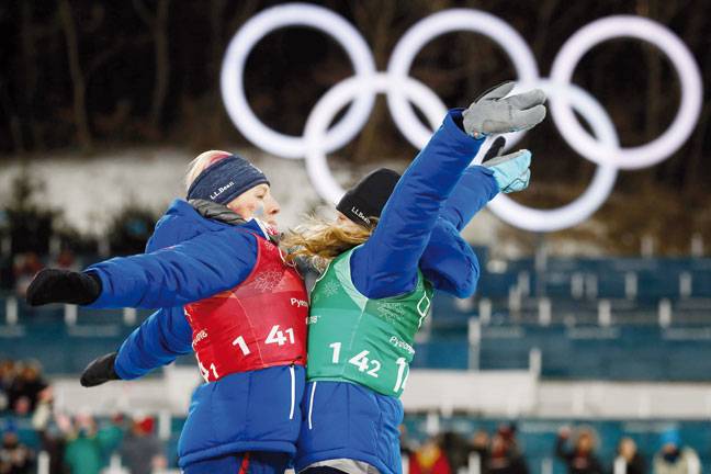 US skiers Diggins, Randall stun field for historic cross-country gold