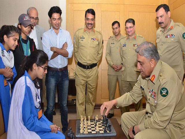 COAS plays chess with student