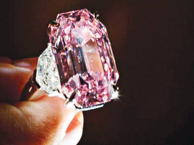 Pink Legacy diamond sold for world record price - BBC News