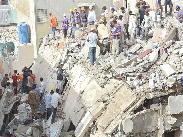 Image result for karachi building collapse