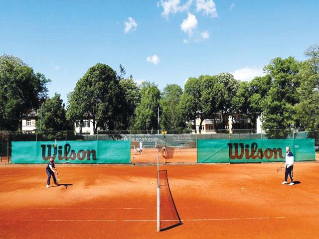 Singles only and don’t shake on it, Austrians return to tennis court