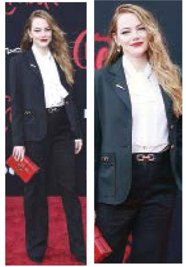 Emma Stone poses at premiere of Disney’s Cruella