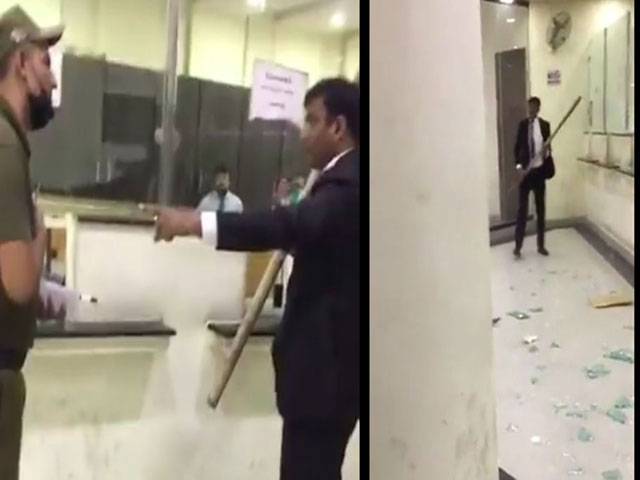 Lawyer smashes counter glasses of LHC Copy office