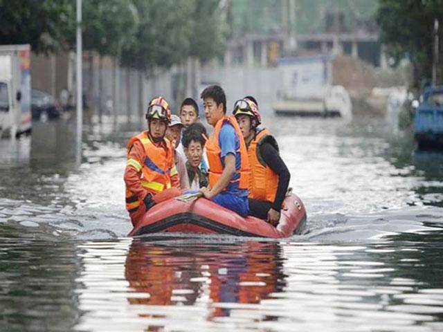 Death toll from NW China flood rises to 26