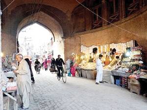 Ancient Koocha Hussain Shah being restored in Walled City