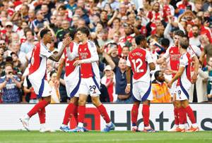 Depleted Arsenal head to Spurs hoping to keep pace with title rivals