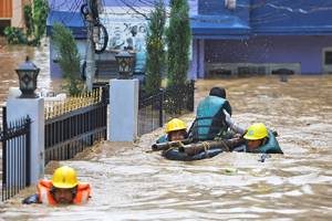 59 dead in Nepal as downpours trigger floods