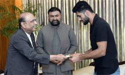 President presents Rs100m award to world karate champion