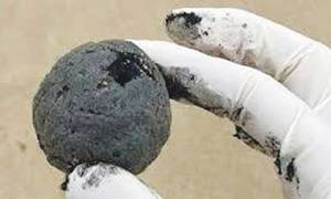 Mysterious black balls close Sydney beaches