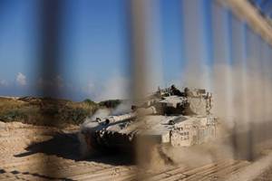 Israeli forces kill 30 Palestinians as tanks roll into central Gaza camp