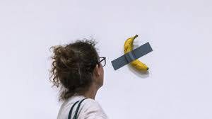 Banana taped to a wall sells for $6.2m in New York