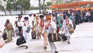 Sikh yatrees return to India through Wagha border crossing