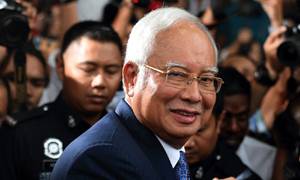 Malaysia drops corruption charges against ex-PM Najib