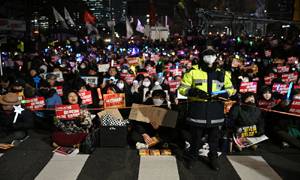 South Korea slaps travel bans on more top officials